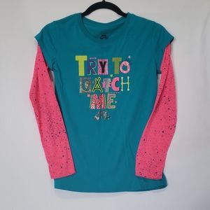 Girls Nike long sleeve t-shirt.